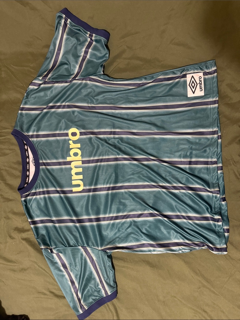 Umbro Men’s Teal Striped Short Sleeve Jersey with Yellow Logo